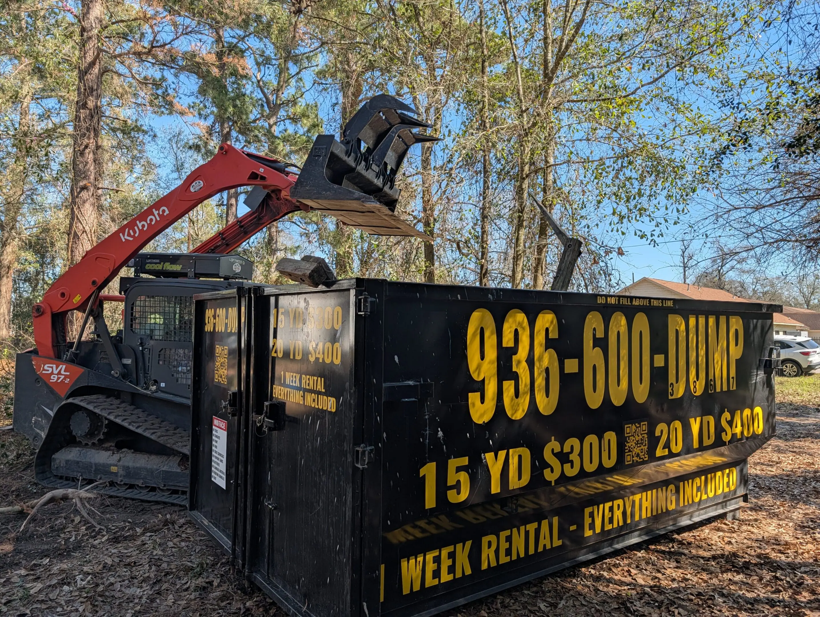 Skid steer performing land clearing and site preparation in Montgomery County TX