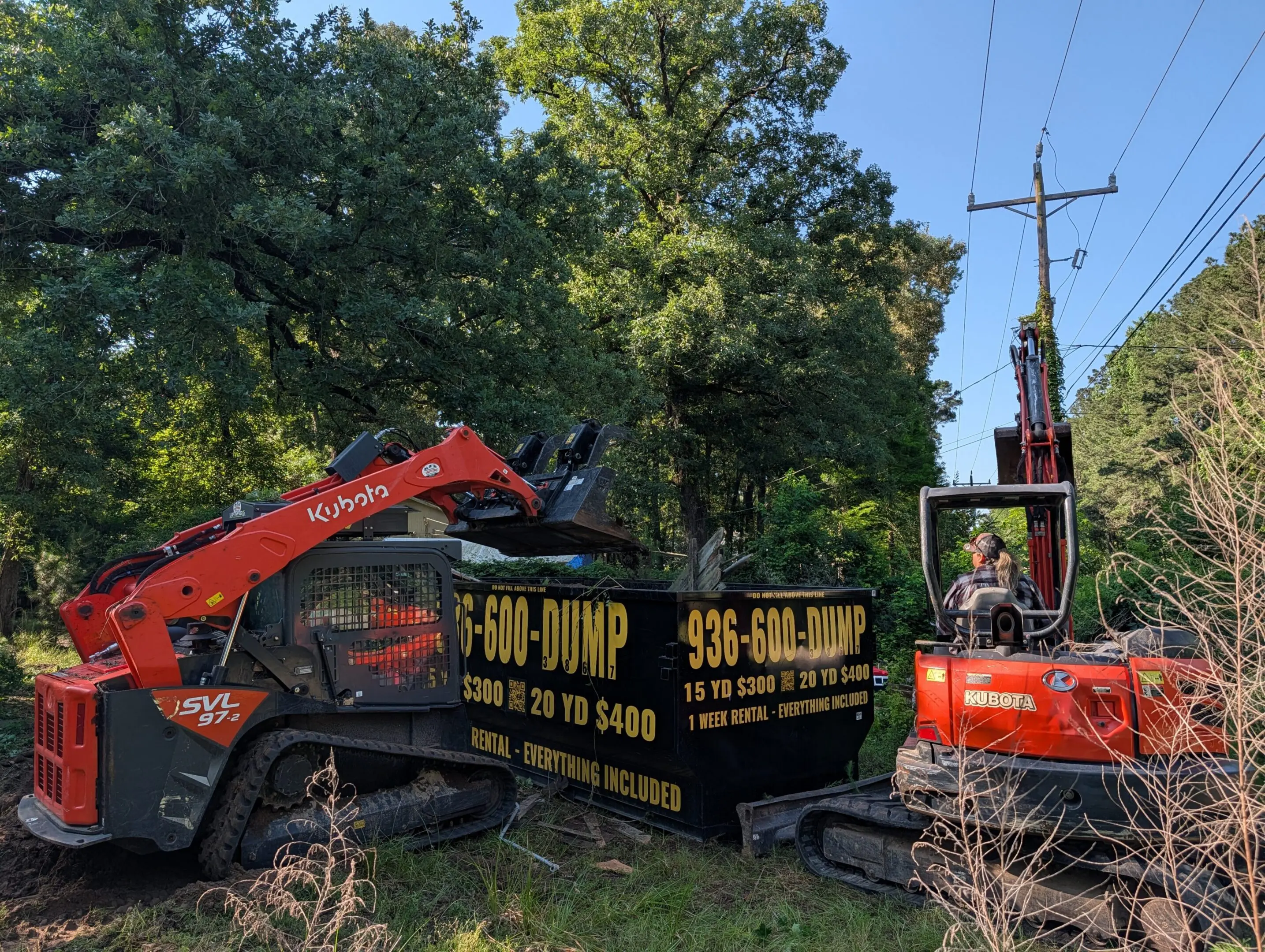 936-600-DUMP Kubota excavator performing land clearing and demolition in Montgomery County TX